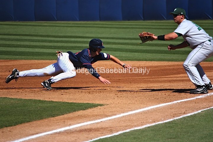 Michael Lorenzen dives back into first base