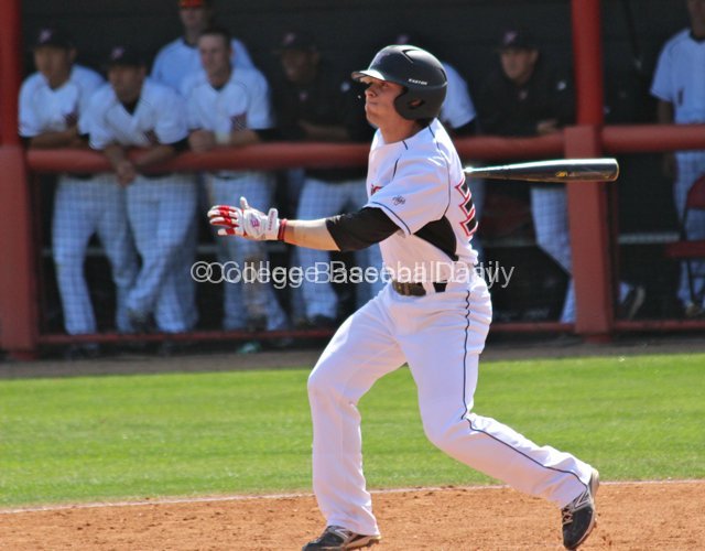 Michael Livingston swings.