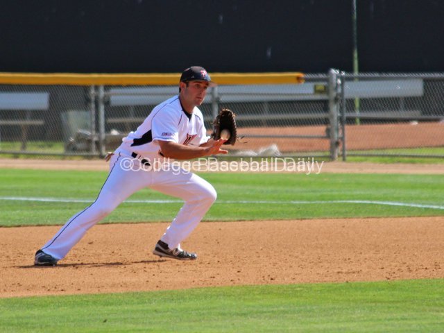 Cal Vogelsang takes the ball to the bag.