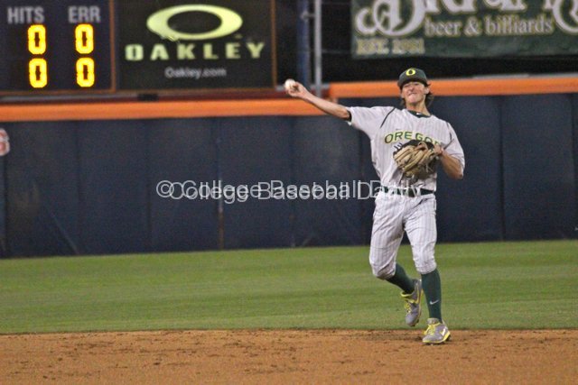Aaron Payne throws to first.