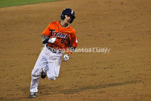 Richy Pedroza prepares to round third base.