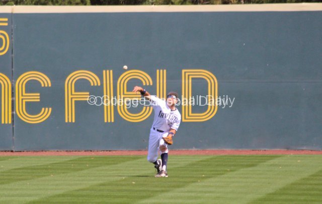 Dominique Taylor tries to throw out a runner.