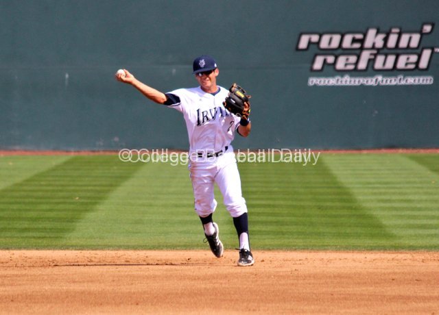 Jeff Stephens throws to first.