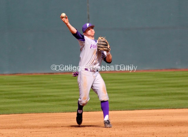 Jeff Melby tries to throw out a batter.