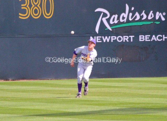 Ryan Barr lackadaisically tries to catch a fly ball.