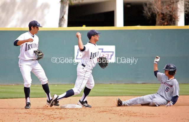 D.J. Crumlich takes it himself to turn the double play.