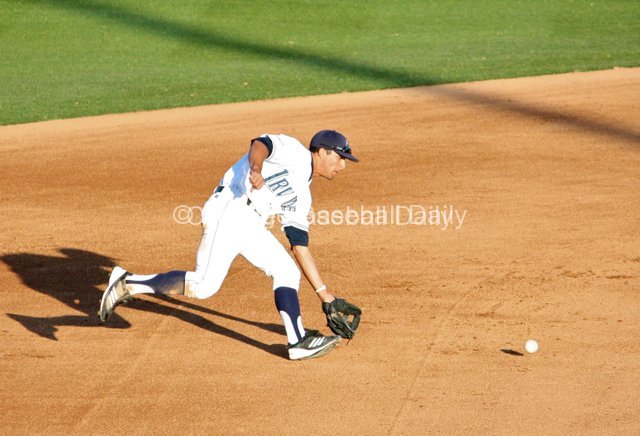 D.J. Crumlich fields a grounder.