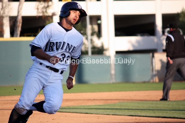 D.J. Crumlich rounds third base.