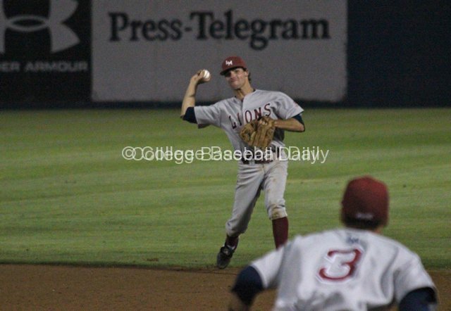 Cullen Mahoney throws to first after knocking a ball down.