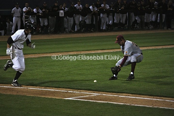 Brady Rodgers fields a bunt.