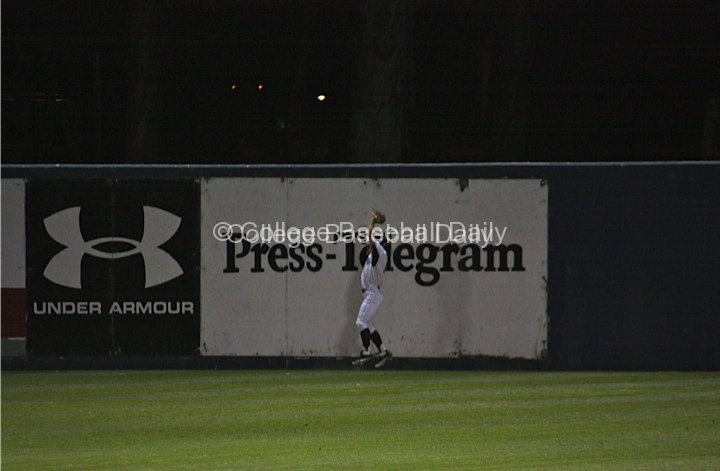 Brennan Metzger catches a ball at the wall.