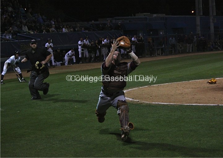 Max Rossiter catches a popped up bunt attempt.
