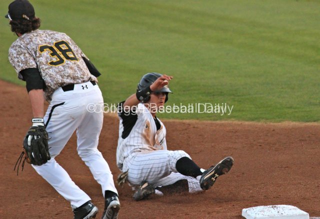 Colby Brenner slides into third.