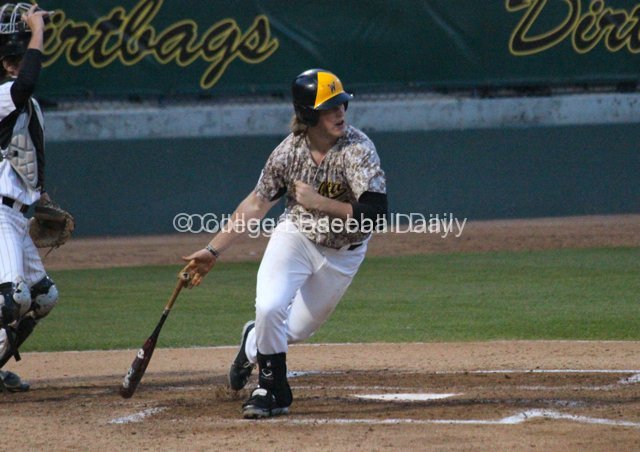 Casey Gillaspie lines a single.