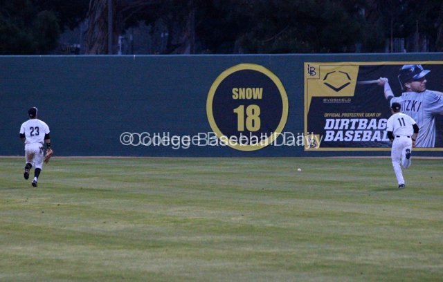 Long Beach's outfielders chase after the ball.