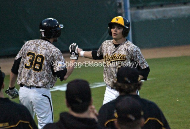 Taylor Doggett is congratulated.