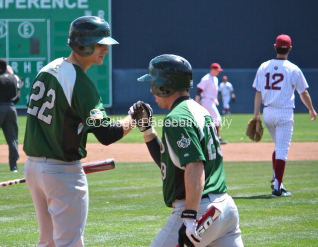 Brendan Hendricks and Jason Mahood celebrate a run.
