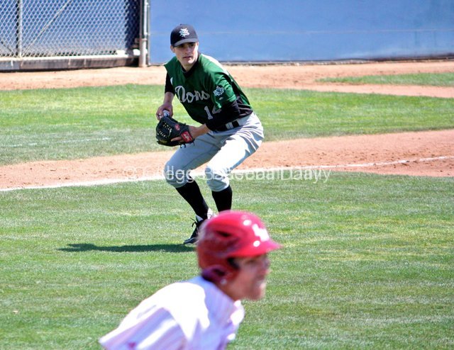 Bob Cruikshank fields a bunt.