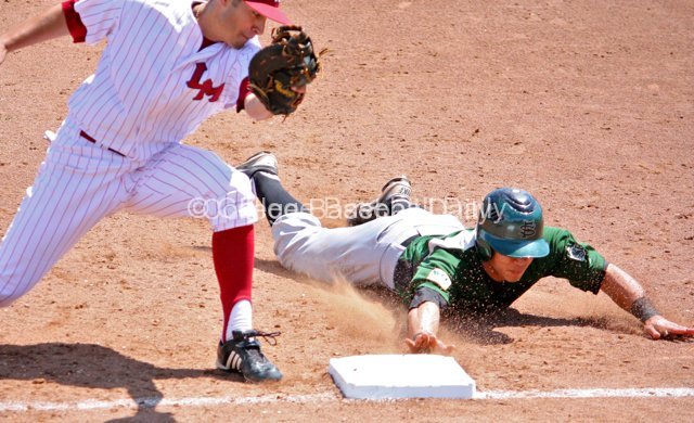 Mason Morioka dives back to first.