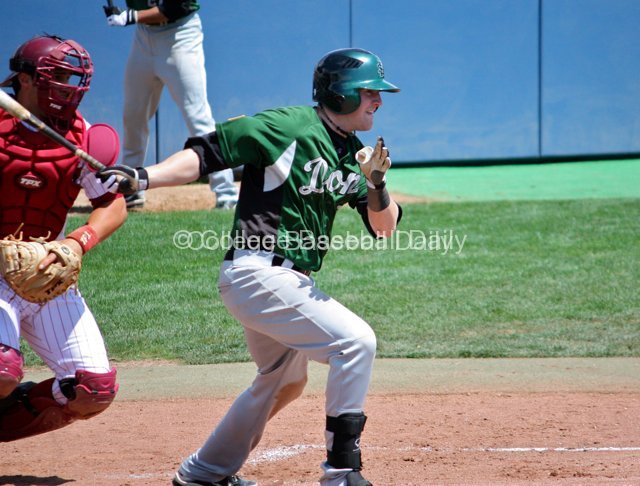 Ted Lemasters lines one of his three hits.