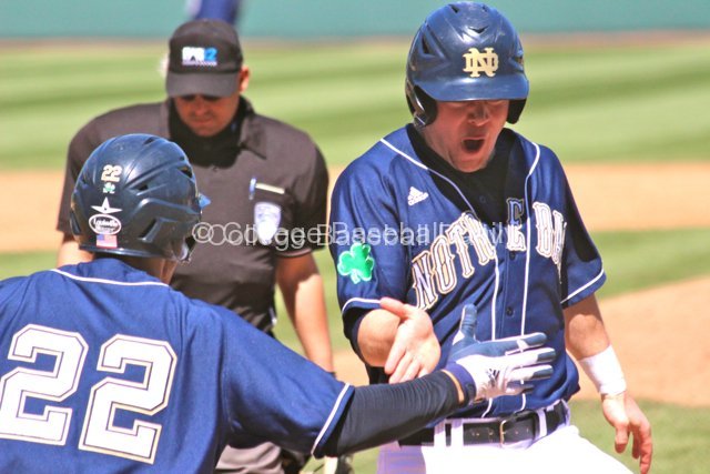 Ryan Bull scores the winning run.
