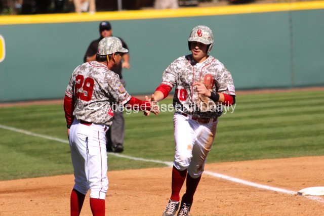 Garrett Carey gets congratulated by Sunny Galloway.