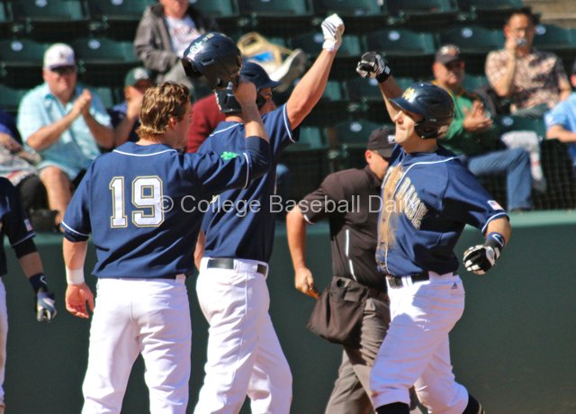 Eric Jagielo is congratulated after his home run tied the game.