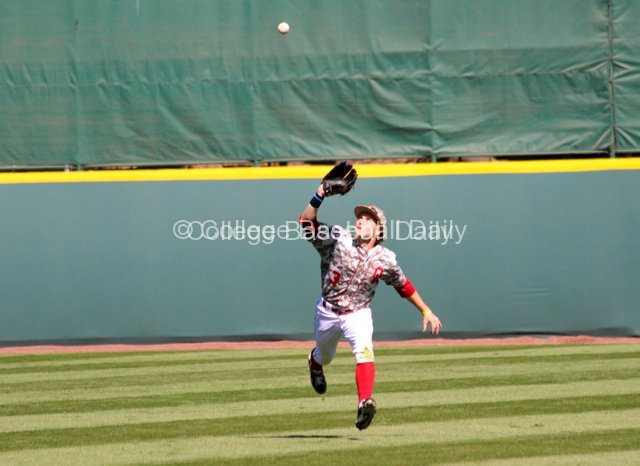 Craig Aikin makes a catch in centerfield.