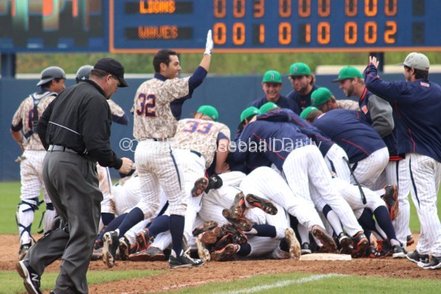Chris Amezquita throws a high five.