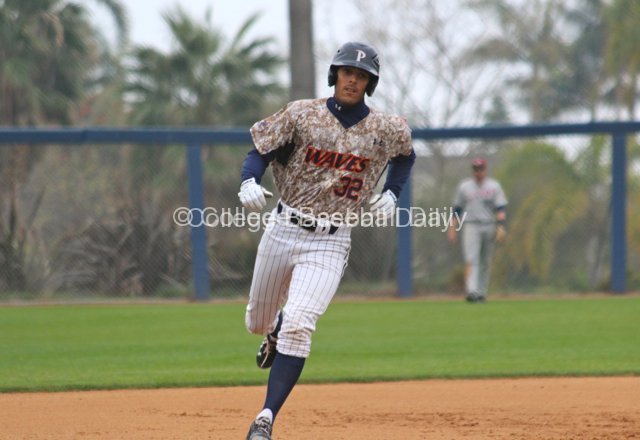 Chris Amezquita comes around in his home run trot.