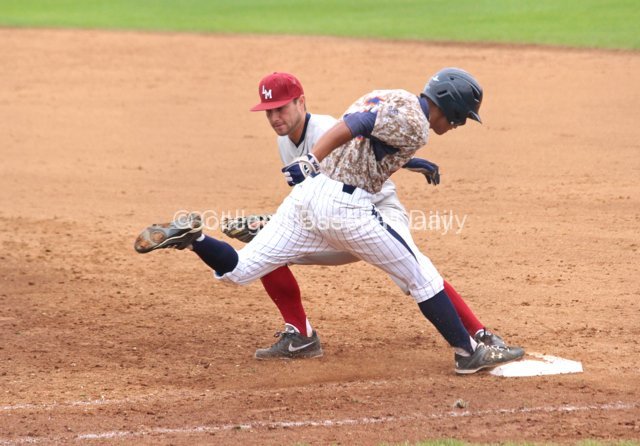 Ranny Lowe lunges for first base.