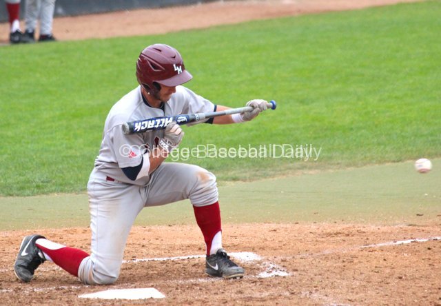 Joey Boney pulls back the bunt.