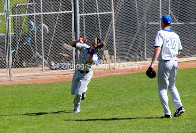 Kyle Grimm nearly drops a popup.