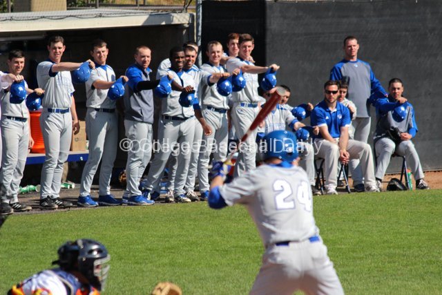 The Seton Hall dugout drives the caps with a full count.