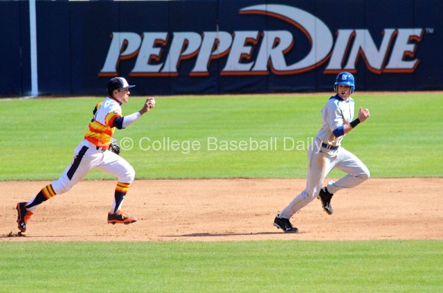 Austin Davidson chases a baserunner.