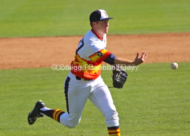 Corey Miller flips to first base.