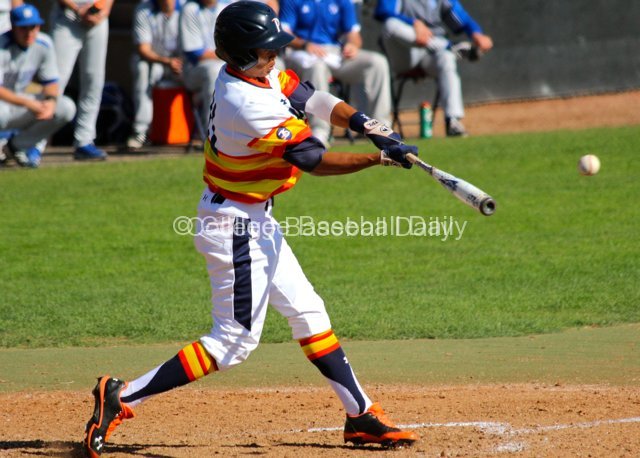 Ranny Lowe hits a line shot.