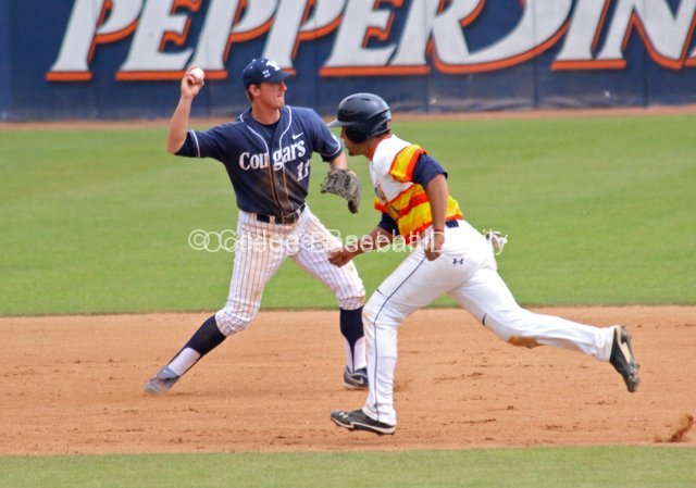 Brock Whitney starts a double play.
