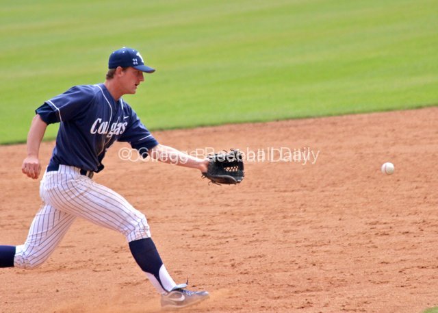 Brock Whitney charges a ball.