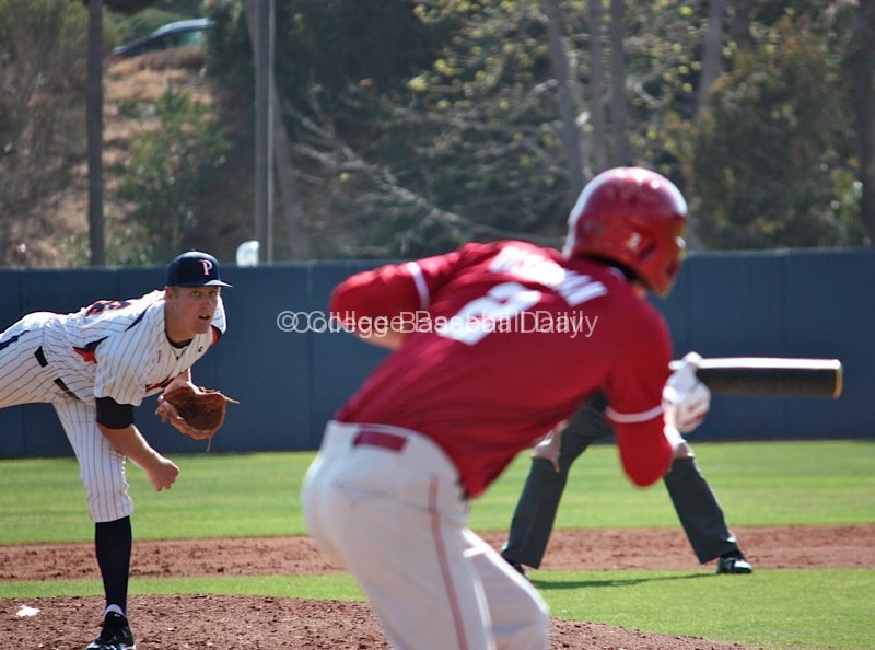 Scott Frazier delivers as Dustin Dishman prepares to lay down a bunt