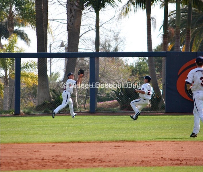 Tony Cooper ranges to left-centerfield for the putout