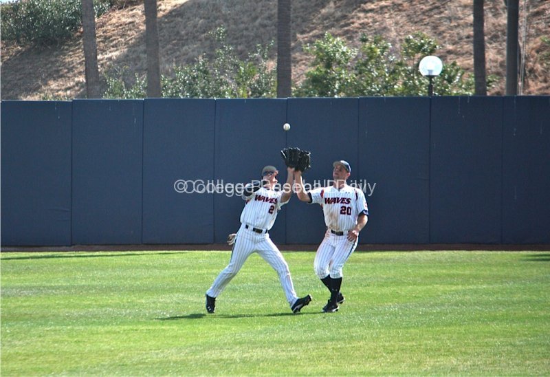 Matt Gelalich and Aaron Brown nearly collide.