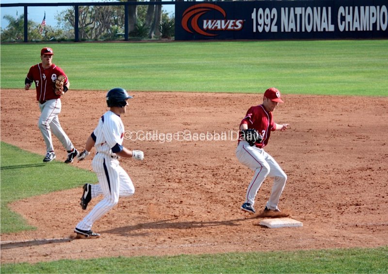 Reliever Ty Taylor misses first base allowing two runs to score