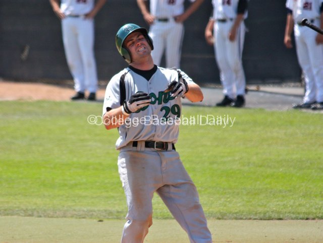 Jason Mahood winces after being hit by a pitch.