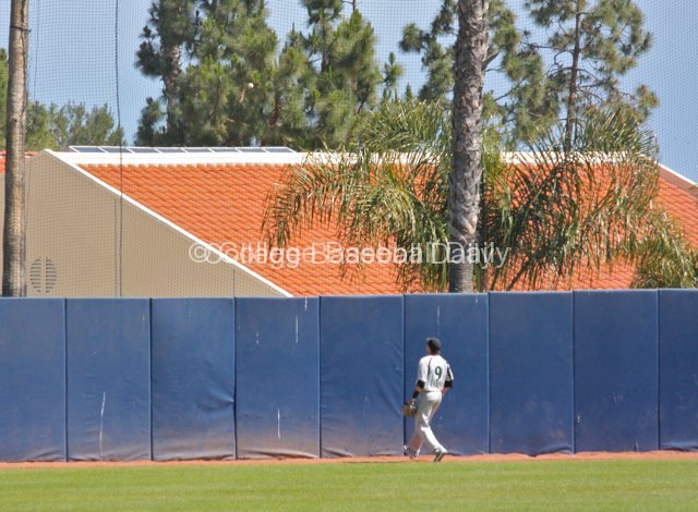 Ted Lemasters watches Sam Meyer's home run fly out.