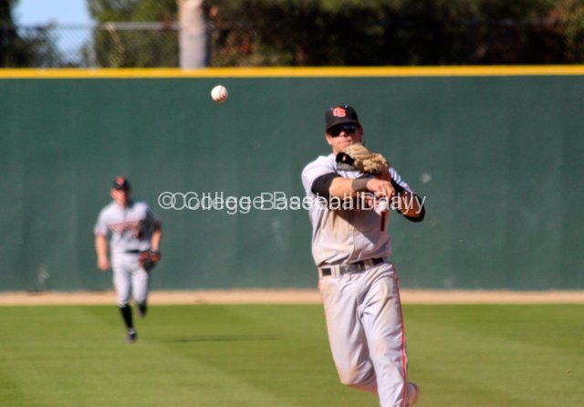 Tyler Smith turns an easy double play.