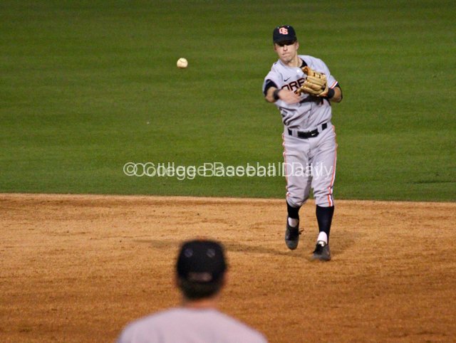 Andy Peterson throws to first base.