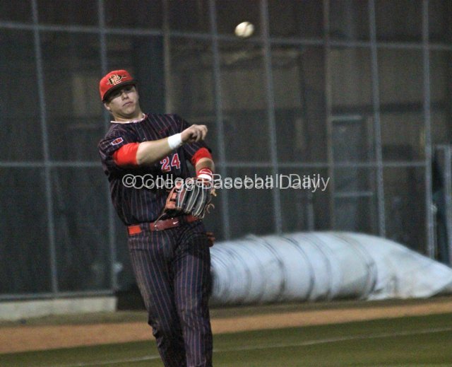 Freshman Tyler France throws to first.