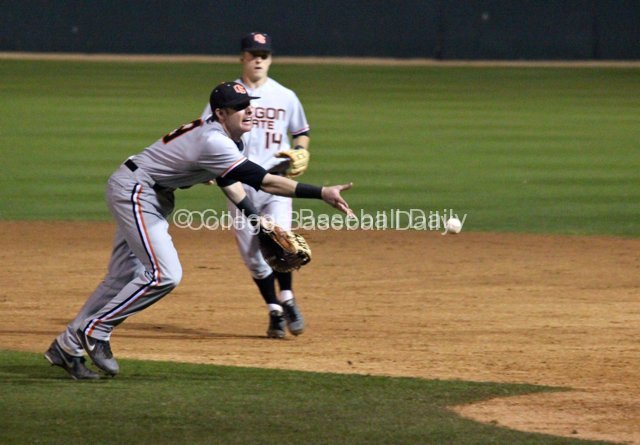 Danny Hayes flips to the pitcher covering first base.