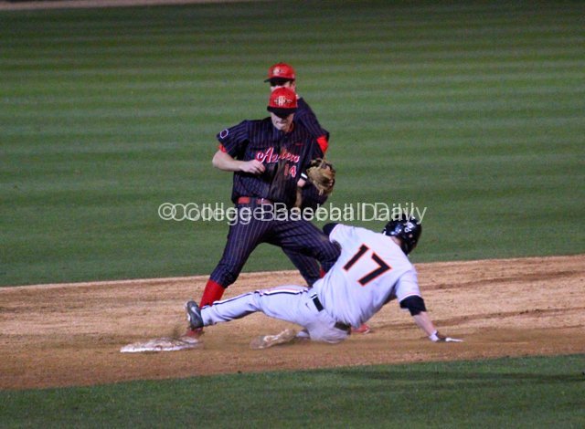 Evan Potter turns a double play himself.